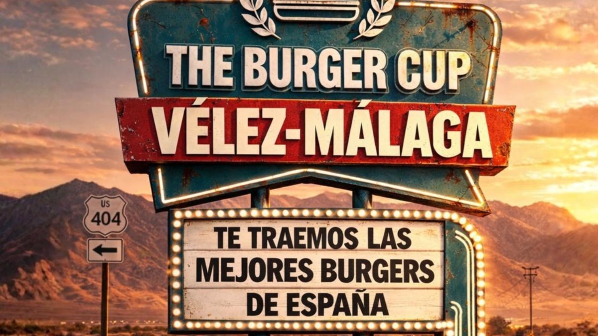Cartel de The Burger Cup en Vélez-Málaga con el lema "Te traemos las mejores burgers de España" sobre un fondo de paisaje al atardecer.